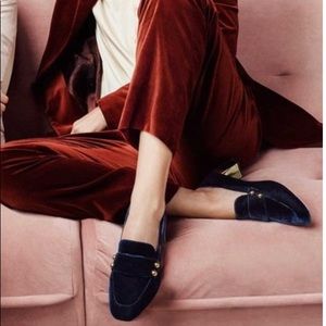 Navy blue Cole Haan Collection loafers.